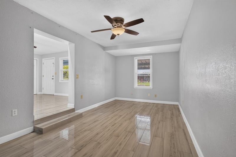 Dining area with wood-look flooring and ceiling fan at 442 Ameca Ave, Orange Park, FL 32073