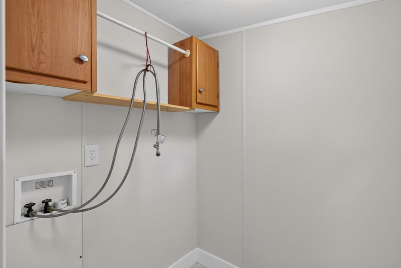 Laundry hookup closet with shelving at 4565 Appleton Ave, Jacksonville, FL