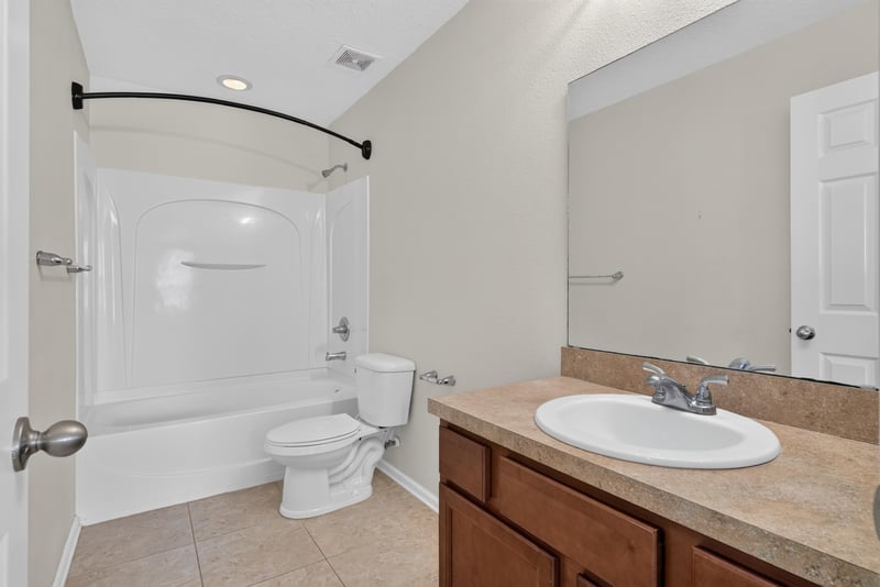 Bathroom with tub and shower combo at 263 Gilmore Ln, Orange Park, FL 32065