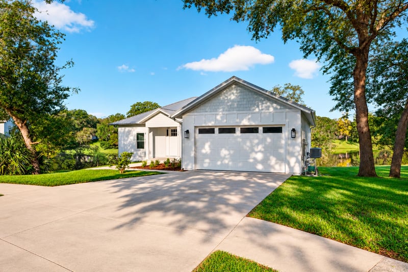 Front exterior with two-car garage and driveway at 175 Alava Ct