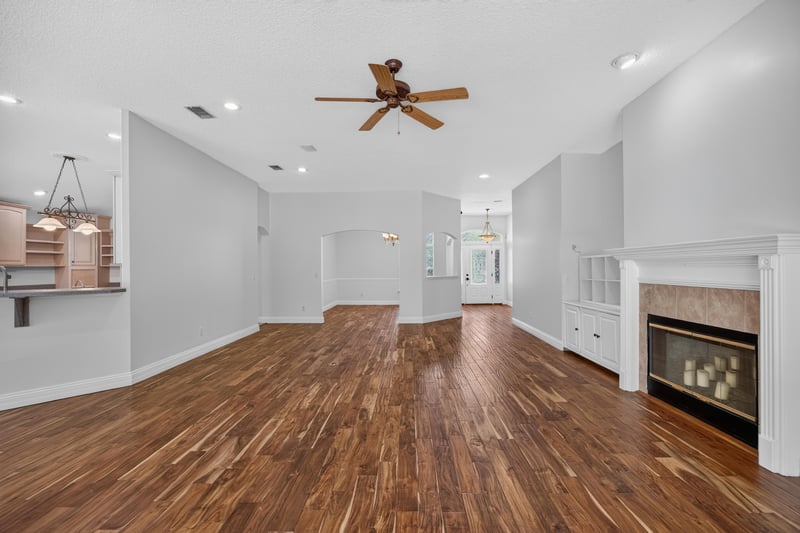 Second living area with fireplace and vaulted ceiling at 11675 Magnolia Estates Rd, Jacksonville, FL 32223