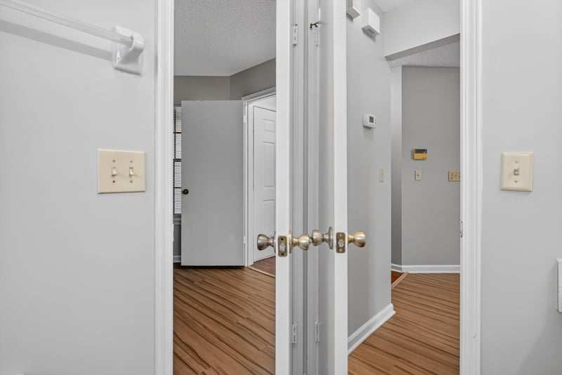 Hallway with French doors at 8010 International Village Dr, Jacksonville, FL 32277