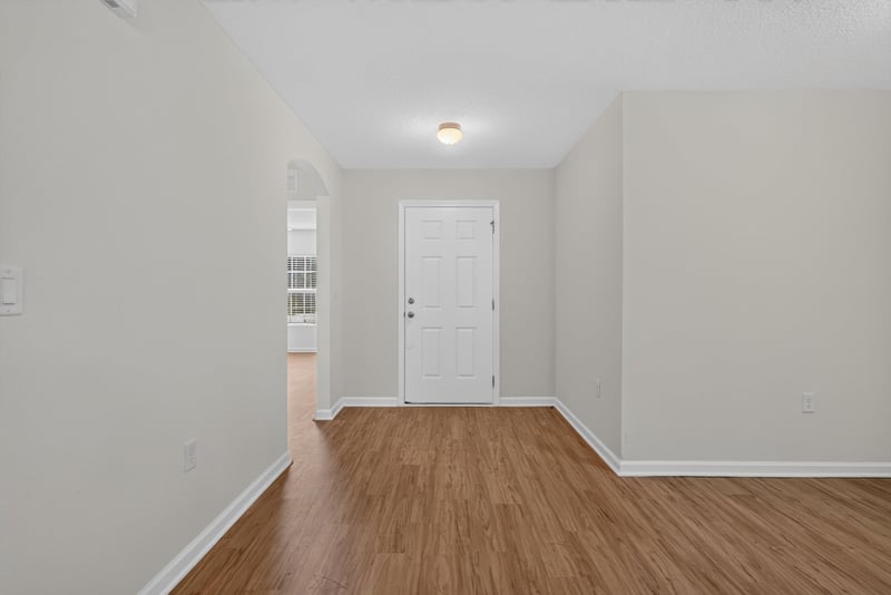 Hallway with interior door at 95221 Siena Ct, Fernandina Beach, FL 32034