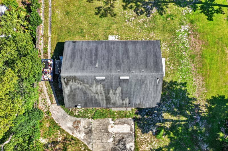 Aerial view of roof and side driveway at 5745 110th St, Jacksonville, FL 32244