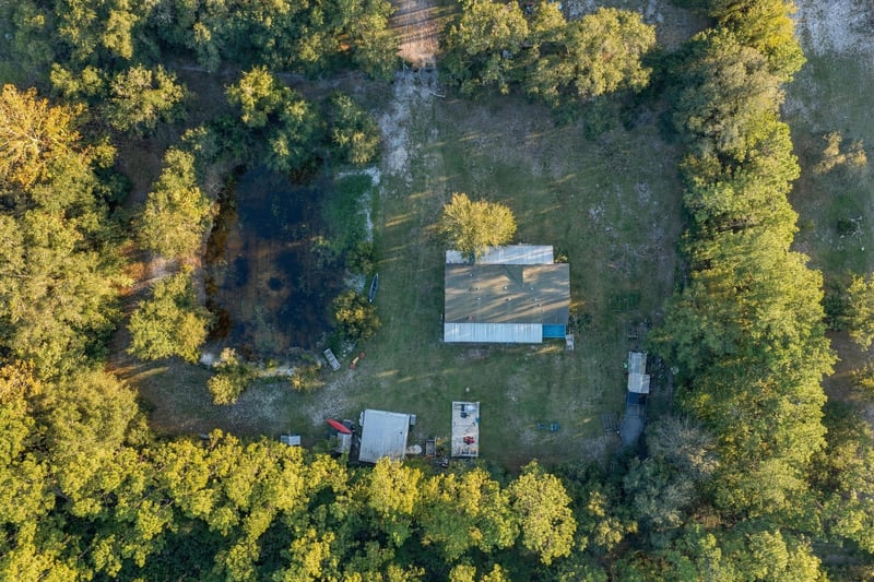 Aerial view of ponds and buildings, photographed by Megapixeler on Secret Cove Rd, Middleburg, FL