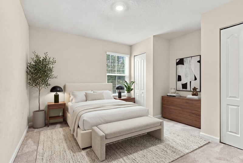 Staged bedroom with bed and dresser at 9555 Star Dr, Jacksonville, FL 32256