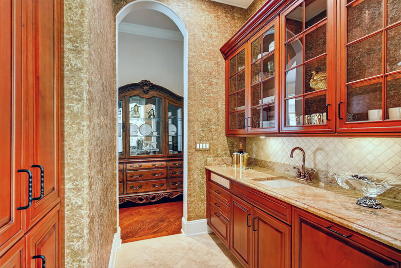 Butler's pantry sink and wood cabinetry at 344 Broward Rd, Jacksonville, FL