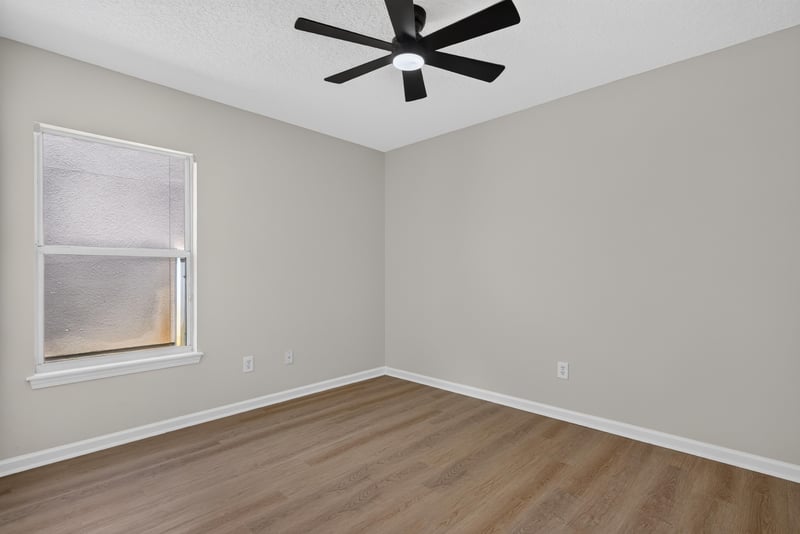 Empty room with wood-look flooring at 224 Pine Arbor Cir, St. Augustine, FL 32084