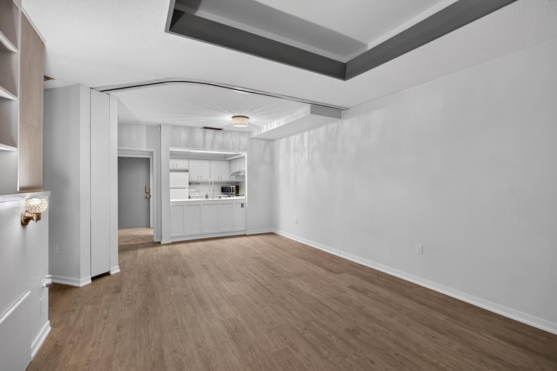 Open living area with wood-look flooring at 2910 Ravines Rd, Middleburg, FL 32068