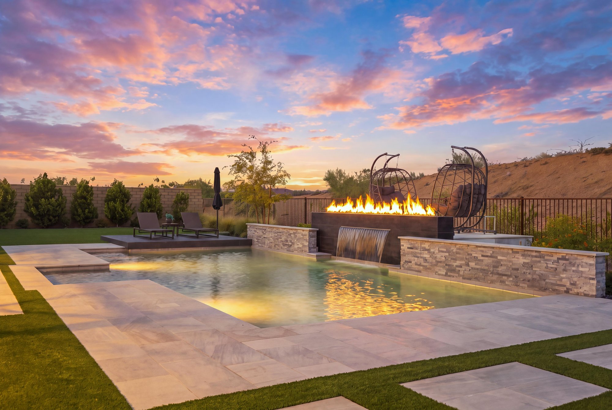Virtual twilight of a pool with a fire feature and a sheer water wall