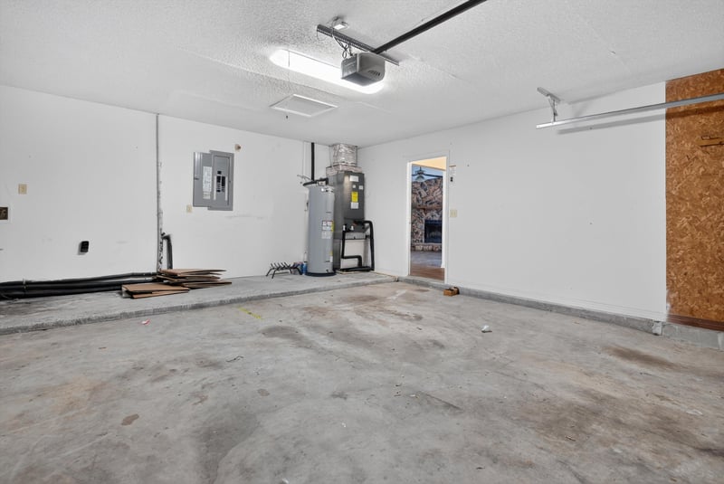 Garage interior with utilities at 1445 Classic Oak Rd W, Jacksonville, FL