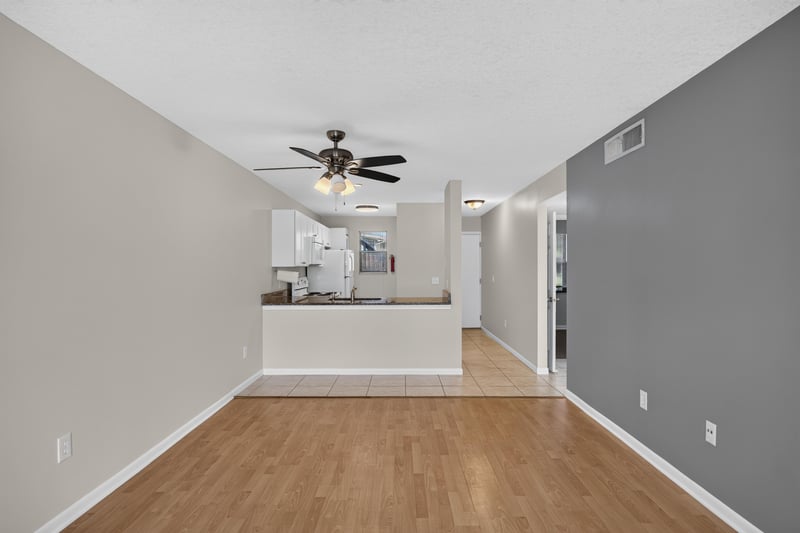 Living and dining combo space at 700 W Pope Rd unit h61, St. Augustine, FL 32080