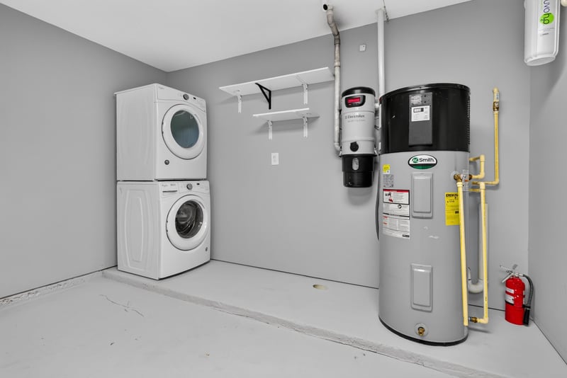 Laundry area with washer, dryer and water heater, photographed by Megapixeler on Birch Run E, Orange Park