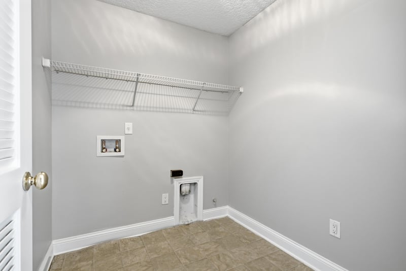 Laundry room with wire shelving at 14187 Big Spring St, Jacksonville, FL 32258