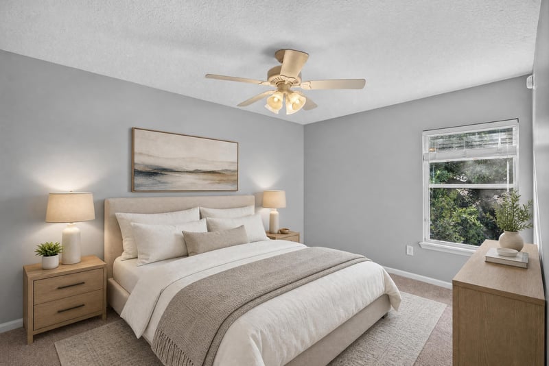 Bedroom staged with bed and ceiling fan at 470 Sparrow Branch Cir, Jacksonville, FL 32259