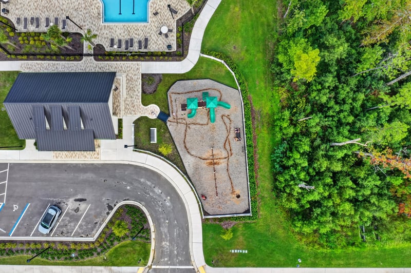 Aerial view of the clubhouse, pool and parking in Middleburg, FL