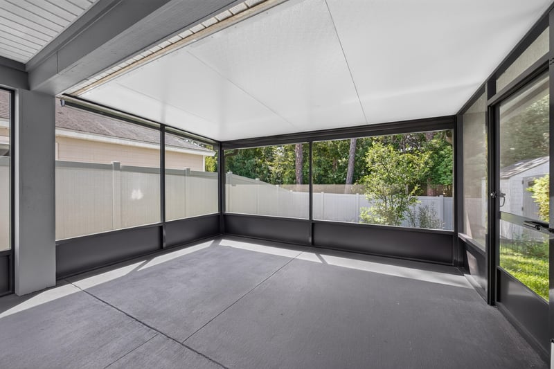 Screened lanai with concrete floor at 7118 Preston Pnes Trl, Jacksonville, FL