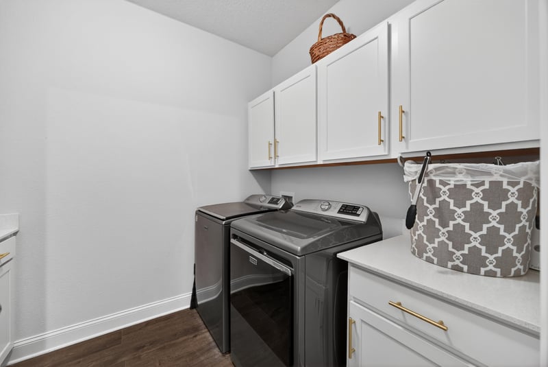 Laundry room with cabinets and folding counter at 85491 Fall River Pkwy, Fernandina Beach, FL 32034