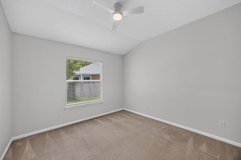 Bedroom with carpet and window at 2480 Ridge Will Dr, Jacksonville, FL 32246