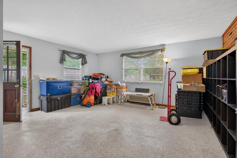 Carpeted room with storage bins at 5745 110th St, Jacksonville, FL 32244