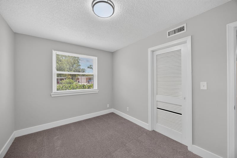 Bedroom with closet and carpet at 6238 Randia Dr, Jacksonville, FL 32210