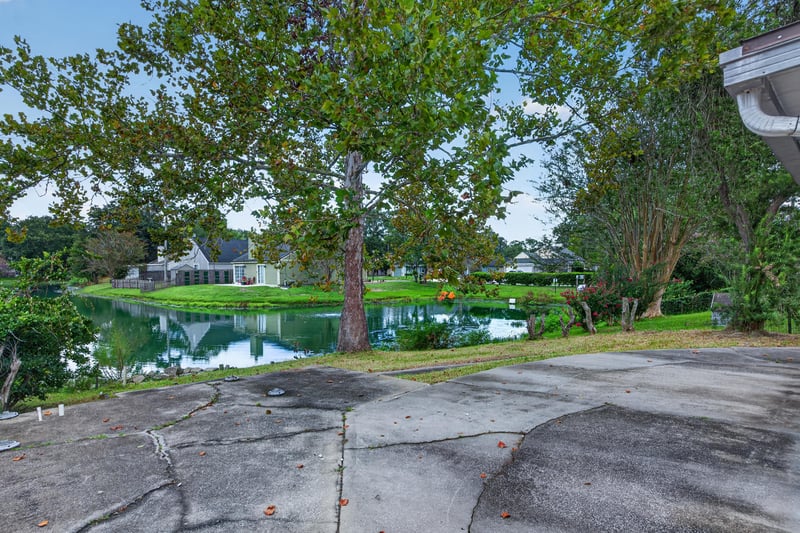 Pond view from the backyard at 8047 Mactavish Way E, Jacksonville, FL 32244