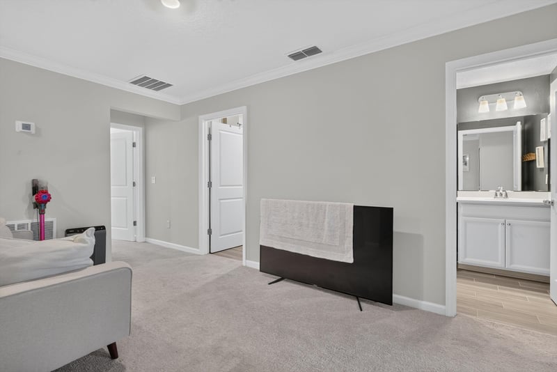Upstairs loft seating area at 1186 Beach Dune Dr, Jacksonville, FL 32233