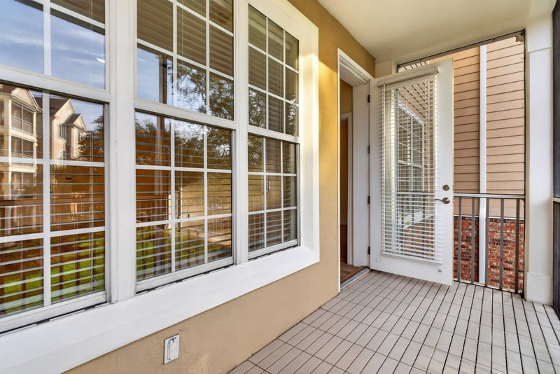 Screened balcony with wood decking at 11251 Campfield Dr unit 1202, Jacksonville, FL 32256