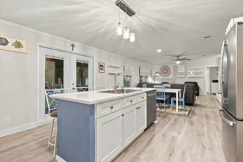 Kitchen and dining view, photographed by Megapixeler on Secret Cove Rd, Middleburg, FL