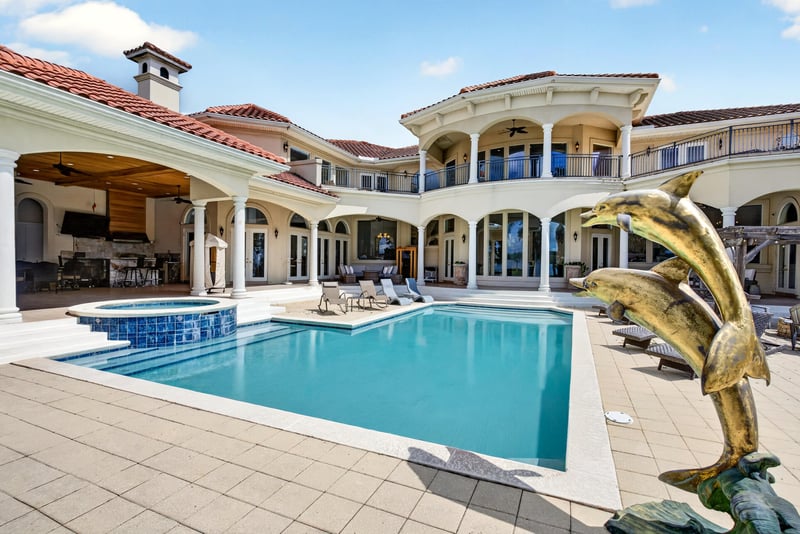 Pool area with dolphin fountain statue at 344 Broward Rd, Jacksonville, FL