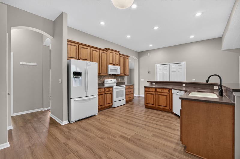 Kitchen island and cabinetry at 1955 GUARDED Way, Fleming Island, FL 32003