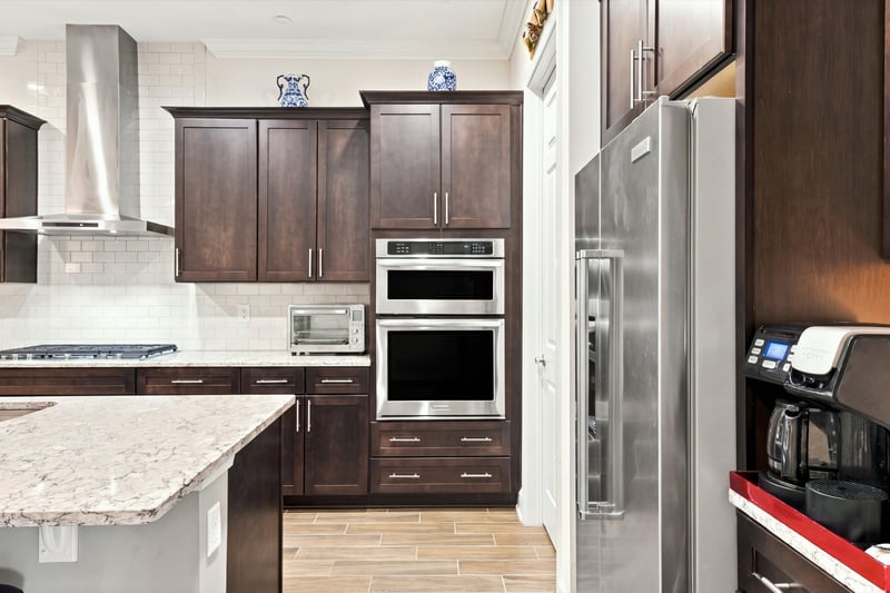 Kitchen with double wall ovens, photographed by Megapixeler on Lucena Ln, Jacksonville, FL