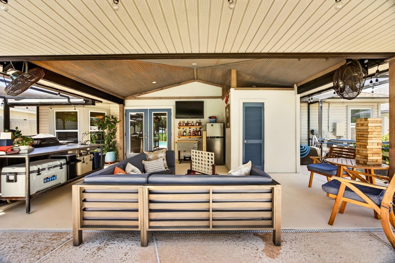 Covered patio outdoor kitchen at 1589 Backwater Drive, Middleburg, FL 32068