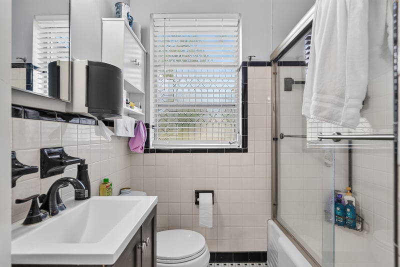 Bathroom with step-in shower and laundry connections at 5745 110th St, Jacksonville, FL 32244
