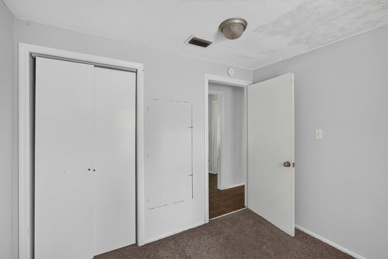 Hallway with carpet and doorways at 2372 2nd Ave, Jacksonville, FL 32208