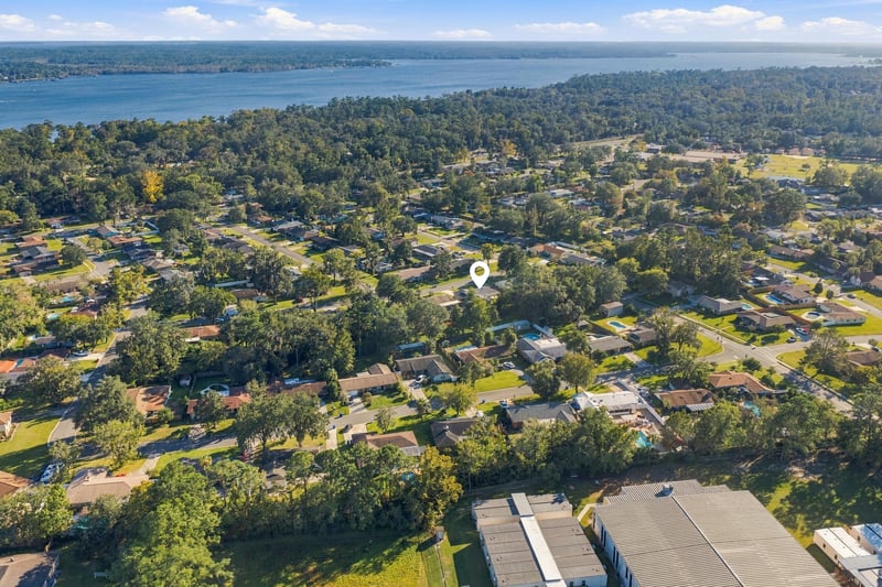 Drone aerial view of the neighborhood and surrounding homes, photographed by Megapixeler on Crosby Ln, Orange Park