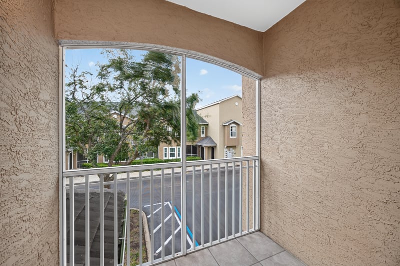 Balcony view through the window at 10075 Gate Pkwy unit 1905, Jacksonville, FL 32246