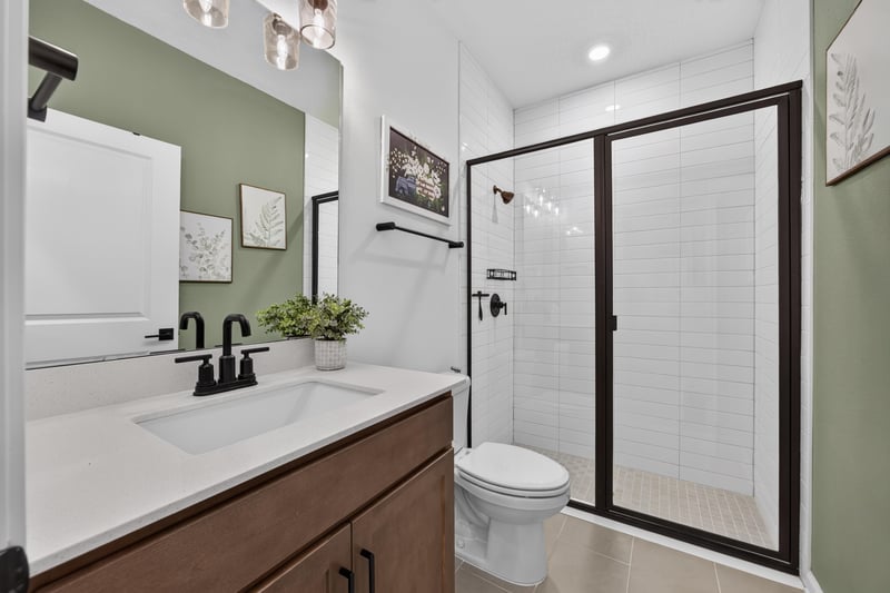 Bathroom vanity with mirror and glass shower at 2354 Jennings Farm Dr, Middleburg, FL 32068