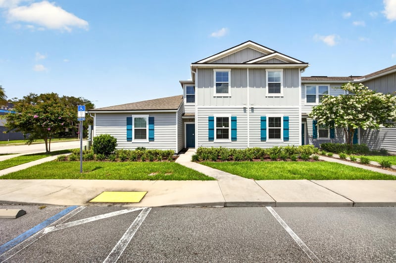 Front exterior in daylight with landscaped walkway at 2837 Black Buck Cir, Jacksonville, FL 32225
