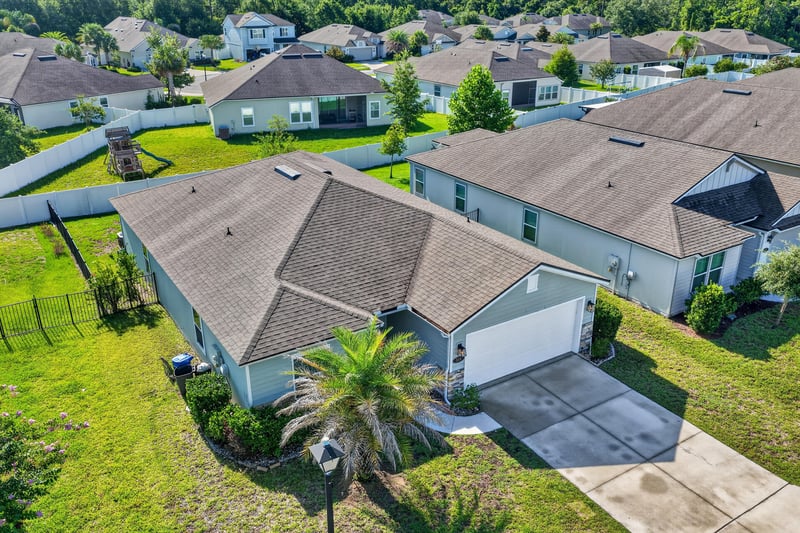 Aerial front view of home and street at 589 Seville Pkwy, St. Augustine, FL