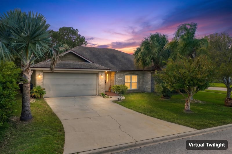 Front exterior day-to-dusk edit, photographed by Megapixeler on Winding Springs Ct, Jacksonville