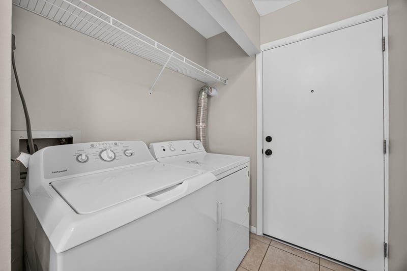 Laundry area with washer and dryer at 700 W Pope Rd unit h61, St. Augustine, FL 32080