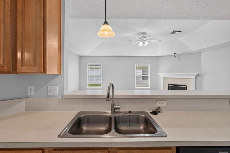Kitchen sink with pendant light above at 11669 Collins Creek Dr, Jacksonville, FL 32258