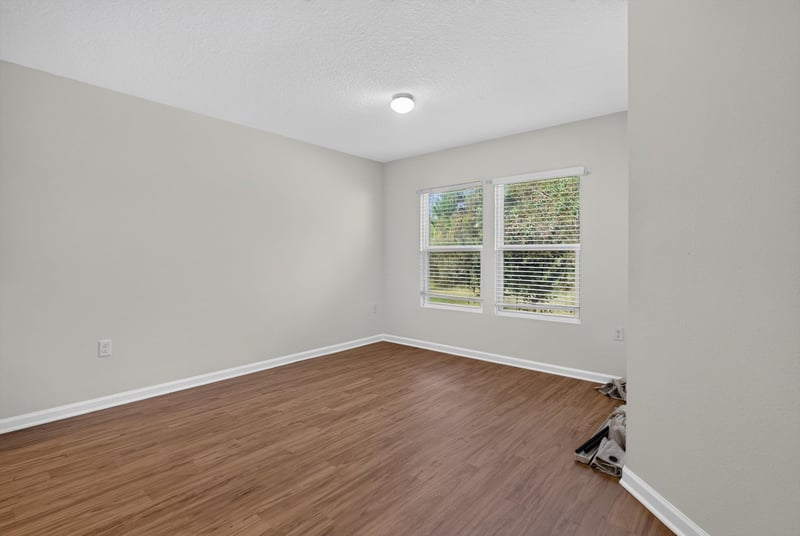 Bedroom corner with window at 95221 Siena Ct, Fernandina Beach, FL 32034