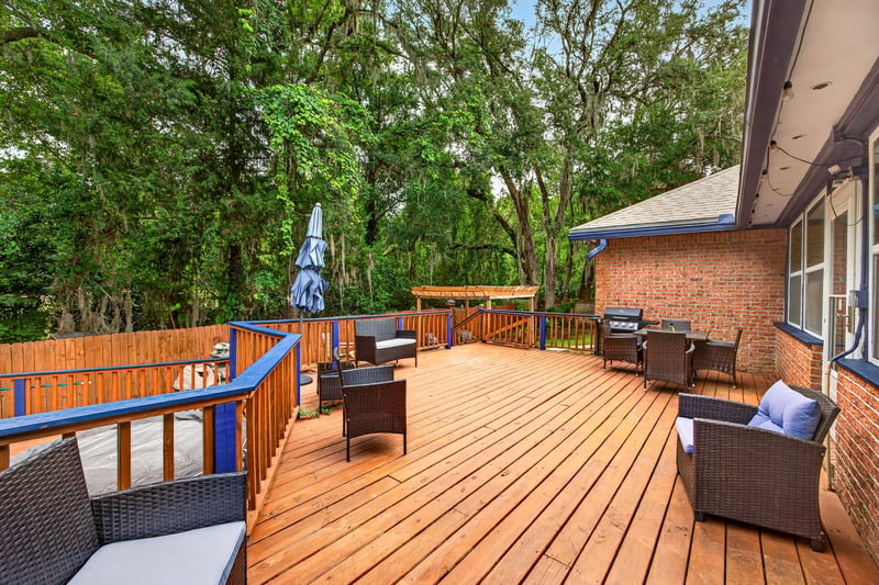 Wood deck with seating area at 981 Marble Ridge Dr, Orange Park, FL 32065