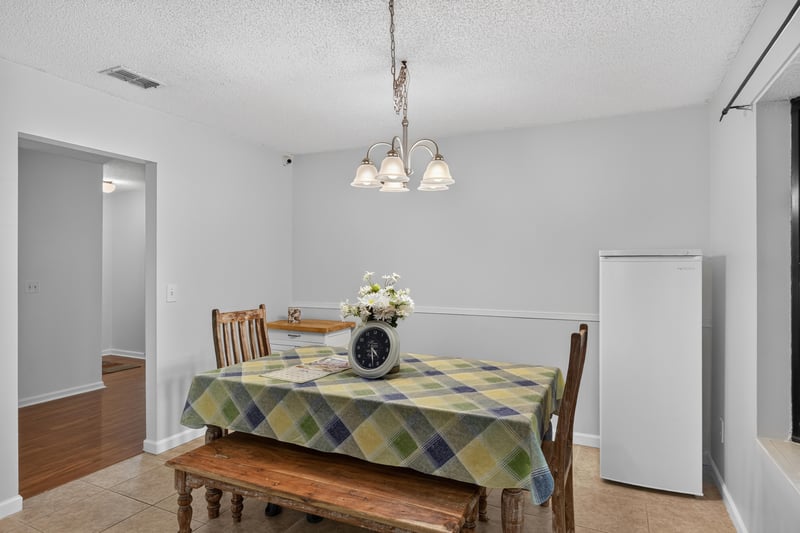 Dining area with table and chairs at 2435 Range Line Rd, Middleburg, FL