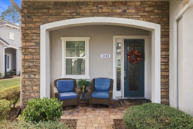 Covered front porch with seating, photographed by Megapixeler on Lucena Ln, Jacksonville, FL