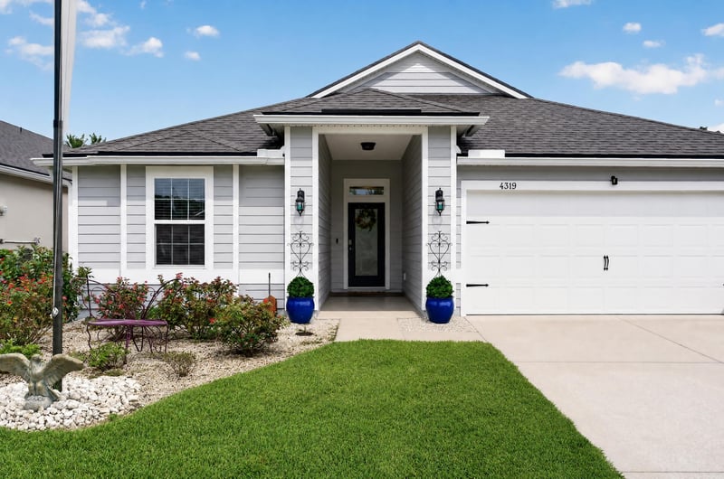 Front entry and covered porch at 4319 Green River Pl, Middleburg, FL 32068
