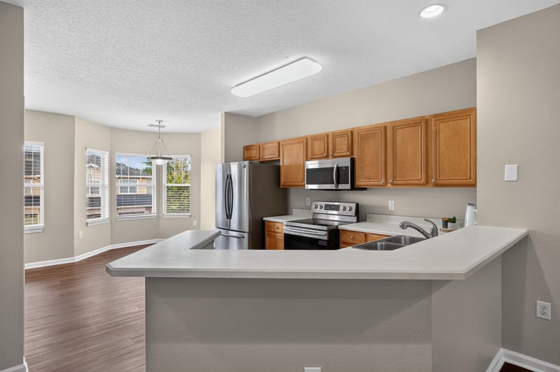 Kitchen with island and stainless appliances at 3750 Silver Bluff Blvd, Orange Park, FL