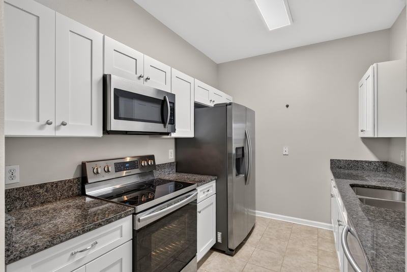 Kitchen with microwave and tile floor at 7990 Baymeadows Rd E #404, Jacksonville, FL 32256